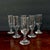 Wonderful cordial/shot glasses by Libbey in the Embassy pattern, set of 6. These feature straight edges and can hold 1 oz...