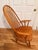 Authentic vintage Colonial-style rocking chair by S. Bent & Brothers, confirmed by the original maker’s stamp on the...