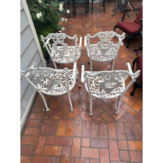 Mid Century Hollywood Regency Molla Cast Aluminum Arm chair in the Patrician pattern