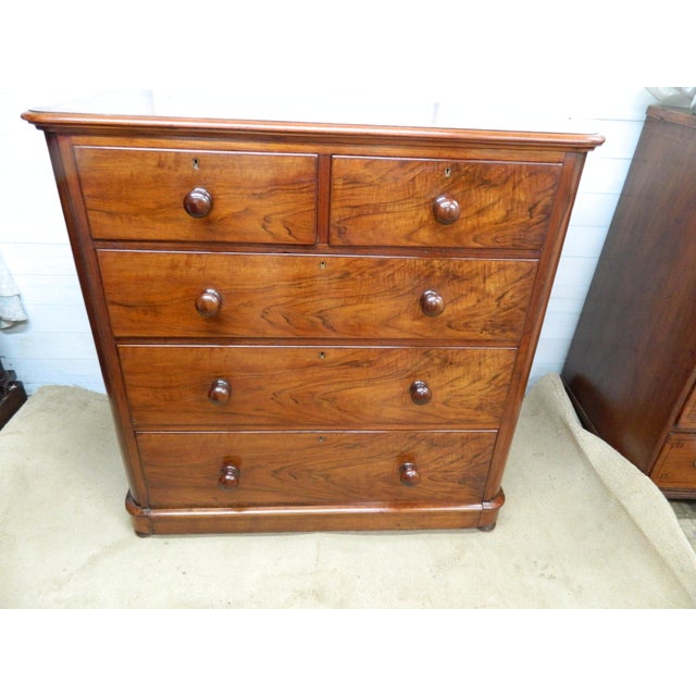 This Victorian Mahogany Chest of Drawers is a timeless piece of antique furniture, perfect for adding a touch of vintage...
