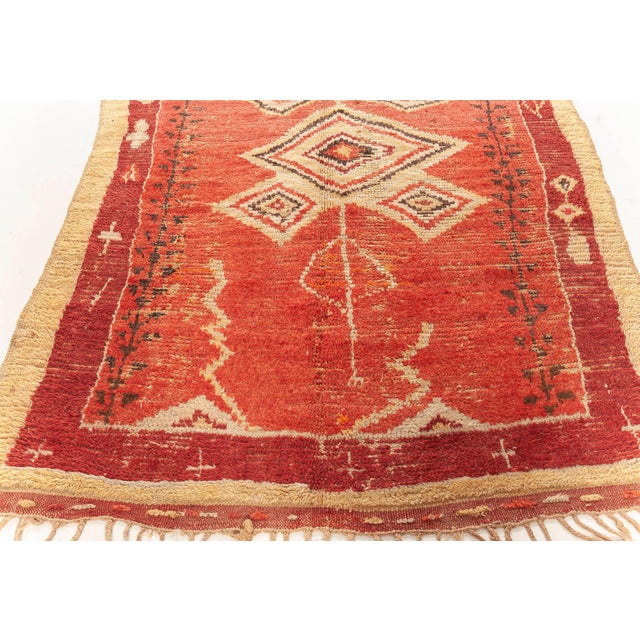This vintage Moroccan rug dates back to 1955 and is hand-woven out of wool. The quality of the wool used in Moroccan rugs...