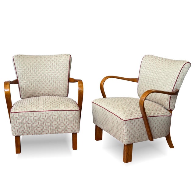 A pair of model h-237 armchairs, designed by jindřich halabala for up závody brno, one of the best-known examples of czech...