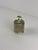 This Fratelli Toso Murano glass paperweight, dating from the 1960s, combines bullicante decoration with red and green...