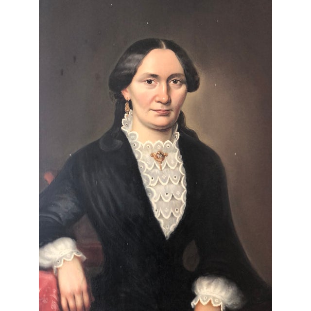 This 19th-century Biedermeier oil portrait shows Friedericke Dreysel, wife of Julius Ferdinand Dreysel, who took over the...