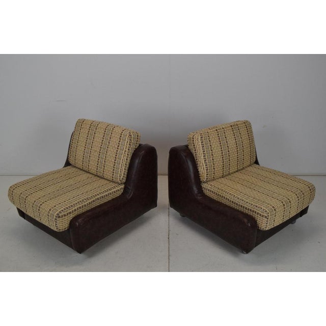 Made in Czechoslovakia. Made of fabric, leatherette .Cushions show signs of use. Original condition.