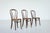 A set of three Thonet "Chaplin" chairs, produced in Romania. This set represents a beautiful blend of minimalist design...