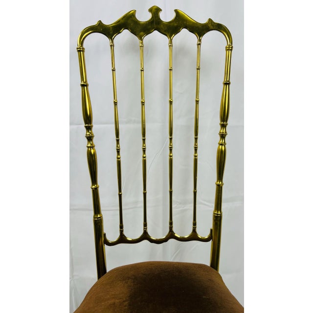 Beautiful brass polished Chiavari high-back chair with coffee colored velvet seat. Designed by Giuseppe Gaetano Descalzi,...