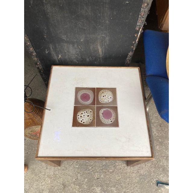 Small coffee or side table attributed to Mado Jolain, France, in good condition This piece is attributed to the mentioned...