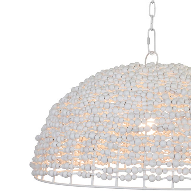 Gorgeous contemporary dome shaped pendant light wrapped with whitewashed wood beads. A unique choice for coastal homes,...