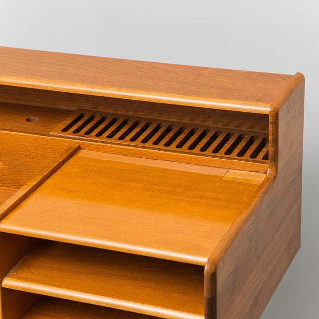 Entryway table made by Fimsa in the 1960s. Wooden frame with metal legs. It shows some signs of wear and a small defect on...