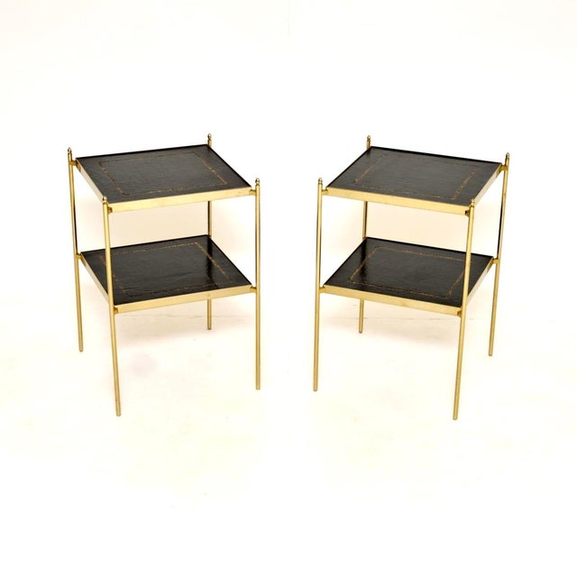 A smart and extremely well made pair of vintage brass and leather side tables. They were made in England, they date from...