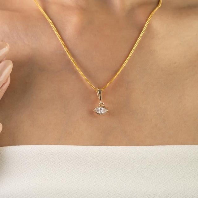 This elegant marquise diamond pendant feature 1 marquise cut diamond totaling 0.29 carats, set in 14k yellow gold. diamond...