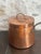 Circa 1840 French copper daubiere with a dovetailed body seam. Includes original lid with riveted copper loop handle, and...