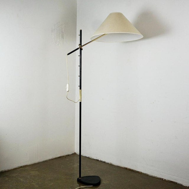 This rare austrian midcentury height adjustable brass floor lamp model 'pelikan' (engl. 'pelican') no. 2097 was designed...