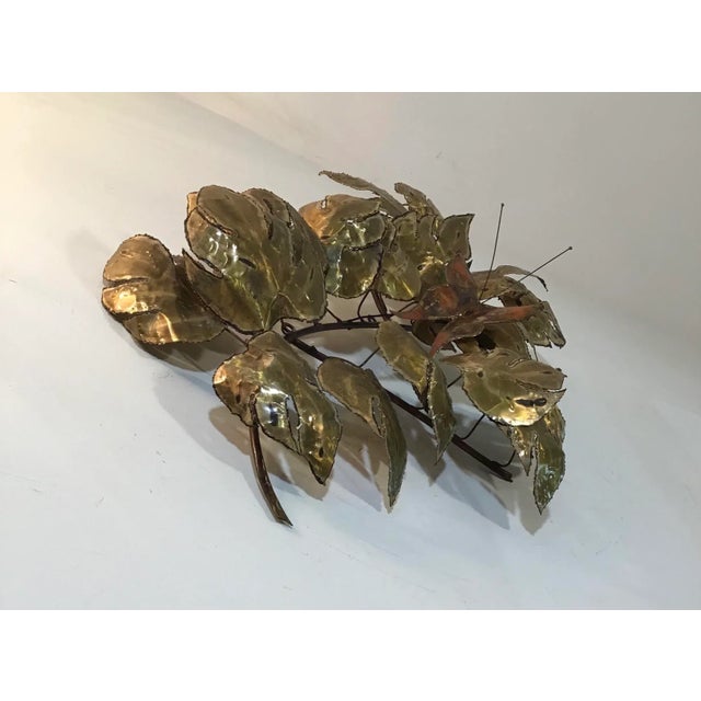 Vintage mid century modern wall hanging sculpture is of a tree branch with extremely dense large leaves with 1 highly...