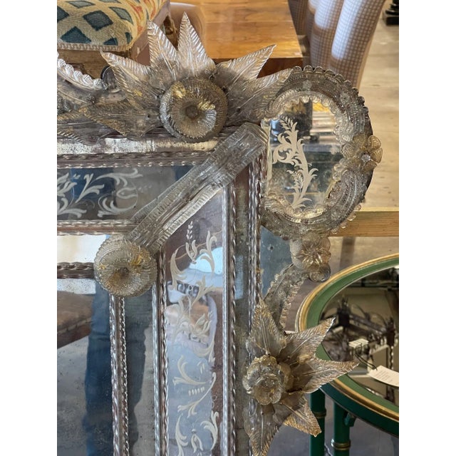 Exceptional 19th century Venetian etched glass mirror with leaves and flowers. Beautiful scrolling shape along with...