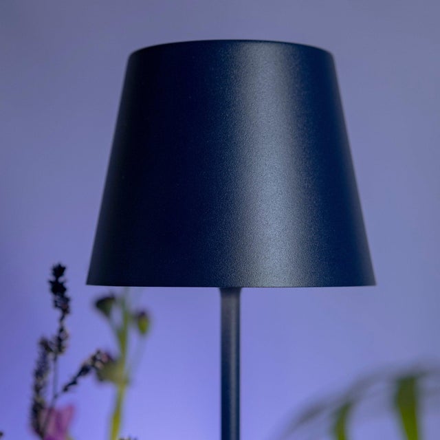 Battery-operated and rechargeable portable table lamp. The lamp features dimming touch control and has 3-CCT color...