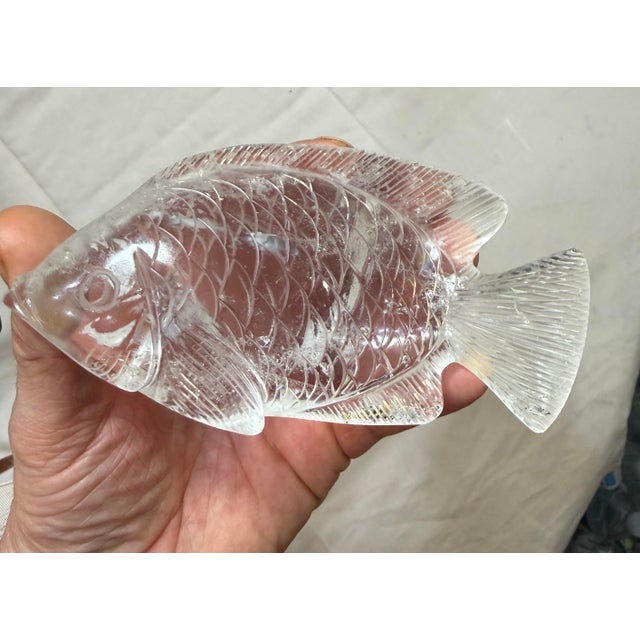 Up for sale is a lovely antique hand carved Chinese clear rock crystal fish sculpture. This intricate and detailed...