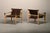 Nice pair of Sirocco Safari Lounge Chairs designed by Arne Norell and manufactured by Norell Möbel AB in Sweden. Solid Ash...