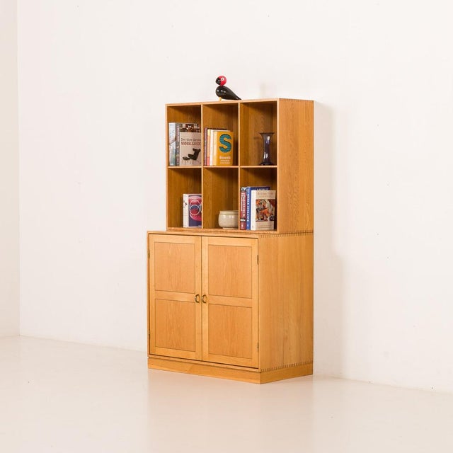 This søborg oak modular bookcase was designed by christian hvidt and produced in denmark in the 1970s, is a refined...