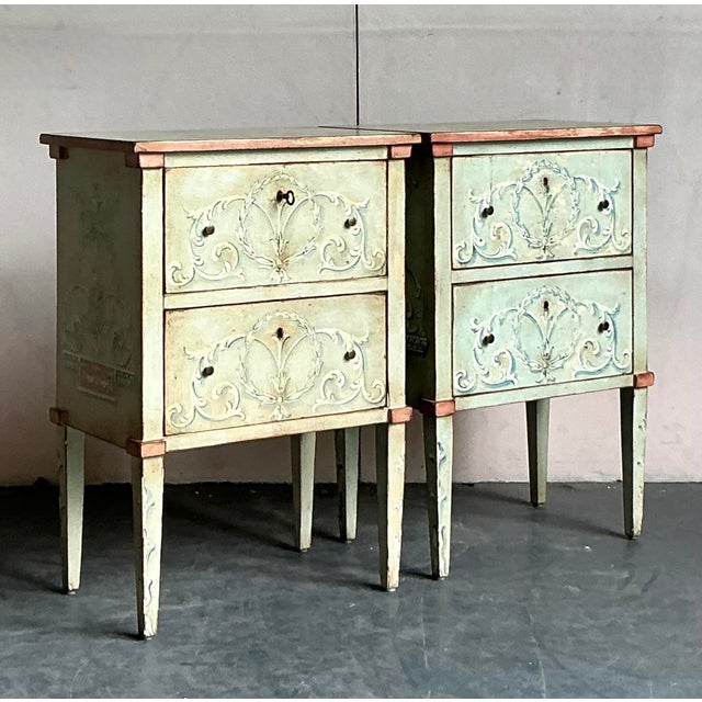 Elevate your bedroom or living space with this exquisite pair of Vintage Italian Regency nightstands. Dating from the...