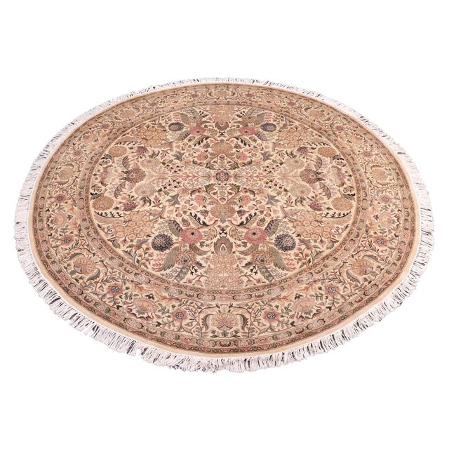 This hand‑knotted Pak Persian round rug showcases the finest expression of traditional Persian artistry. Each piece is...
