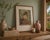 This piece features one of Hibel’s signature subjects—a delicately rendered child portrait, executed with soft tonal...