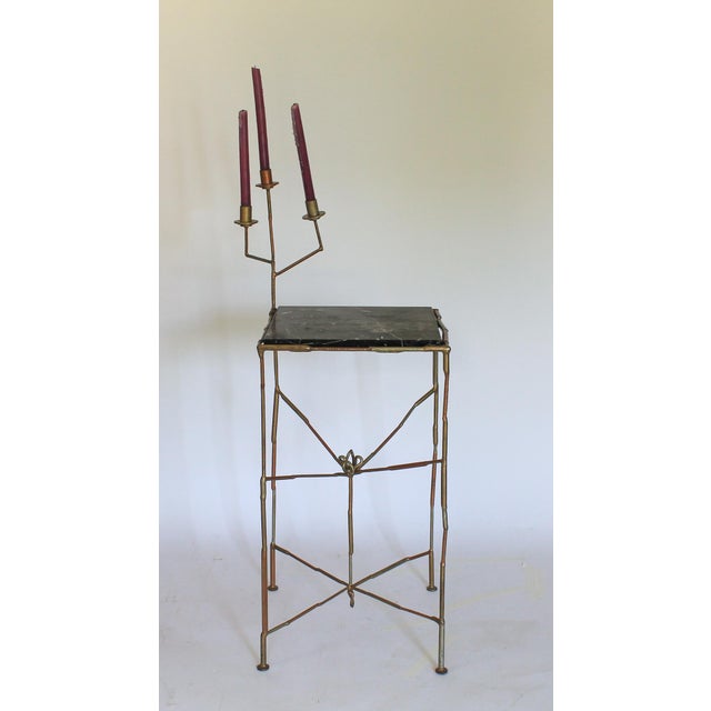 One of a kind artisan made table with marble top and three taper candle holders. Marble top is removable. Can also be...