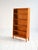 Solid pine bookcase with five adjustable shelves and a solid lateral support structure. Scandinavian production, mid-20th...