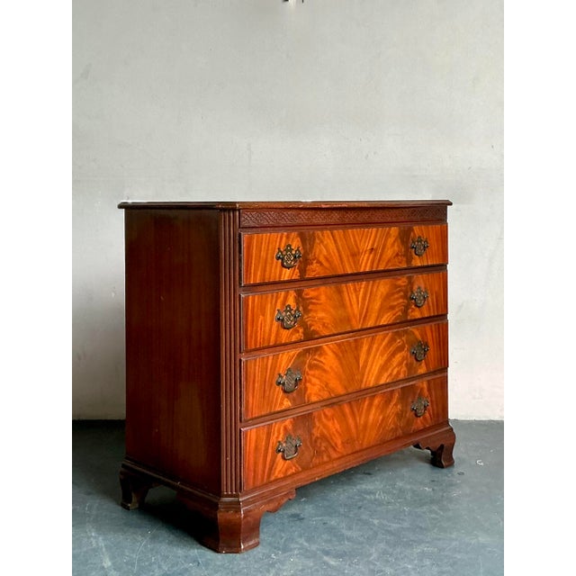 Presenting a superb Vintage Regency Flame Mahogany Chest of Drawers, a distinguished piece that effortlessly blends...