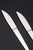 Henning Koppel for Georg Jensen, two small lunch knives Caravel. Two lunch knives in stainless steel and sterling silver...