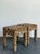 This striking pair of vintage stools embodies the bold, glamorous spirit of Hollywood Regency design. Fully upholstered in...