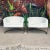 Striking pair of vintage cantilevered barrel-back club chairs, often attributed to Milo Baughman, featuring sleek chromed...