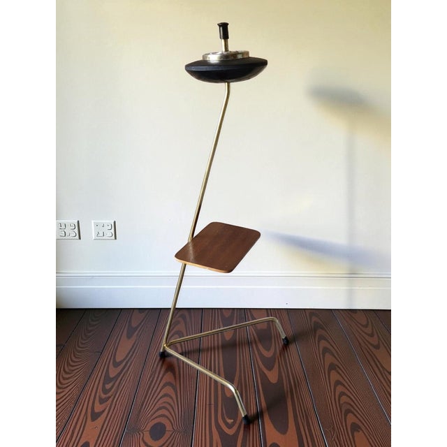 Standing ashtray with shelf from the 1970s. The ashtray emptying mechanism works perfectly. In good condition with signs...