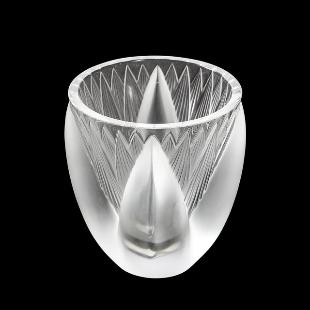 The Mid-Century Modernist Frosted Crystal "Thebes" Vase, signed Lalique France, circa 1960, is a magnificent example of...