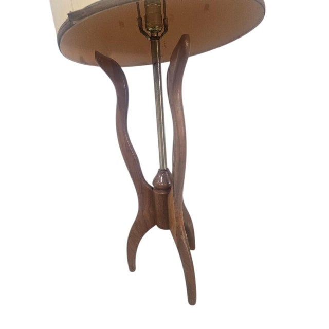 Description: Bring classic mid-century style into your home with this vintage floor lamp, dating from the late 1950s to...