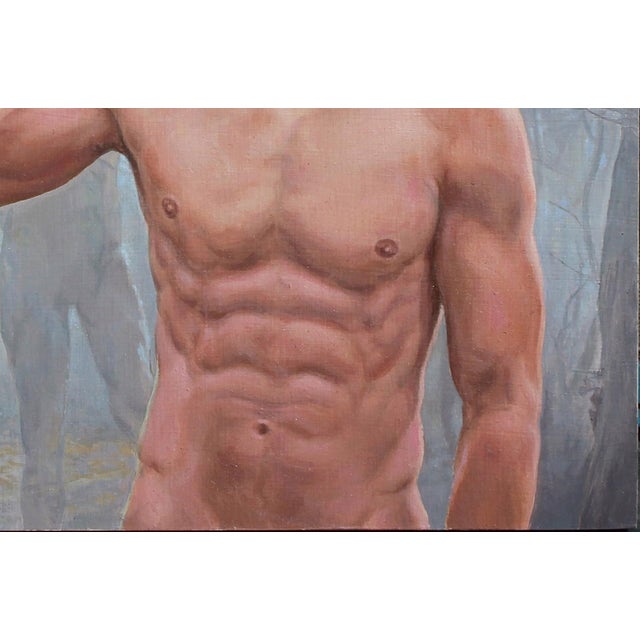 The artwork depicts a young man, posed in a serene yet contemplative manner, as he balances a shimmering orb on his...