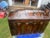 19 century steamer, trunk or blanket, trunk refurbished pretty much normal wear and tear before the age. It’s really nice.