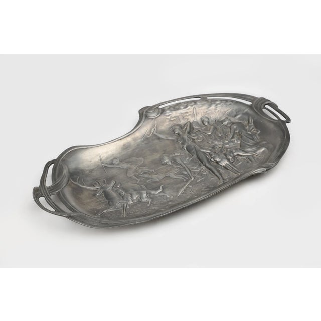 France / 1910 / dish / tin / Art Nouveau / Art Deco Diane Goddess of the Hunt An Art Nouveau hammered pewter bowl with...