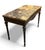 Marble-topped tables have been a symbol of luxury and durability for centuries, often featuring ornate bases that reflect...
