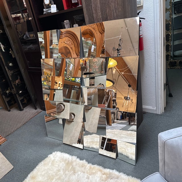 Design Plus Gallery presents a Faceted Slopes Wall Mirror from Machine Age Modern. The mirror consists of multiple beveled...