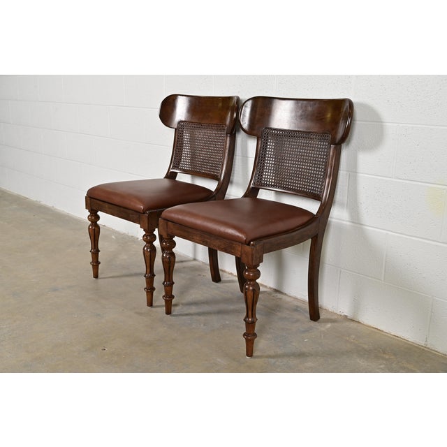 A gorgeous pair of English Regency style side chairs or dining chairs By Ralph Lauren for Henredon Circa Late 20th Century...