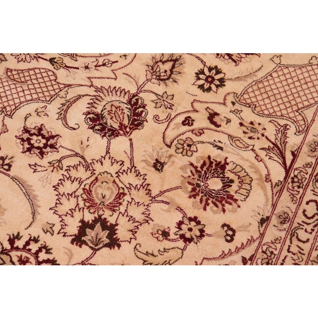 Designed with mesmerizing intricacy and gorgeous color palette, this hand-knotted masterpiece demonstrates the beauty and...