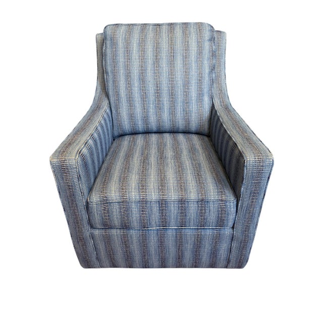 Quick Hits: - Custom-made CR Laine swivel and glider chair with ottoman - Custom upholstered in a soft blue striped fabric...