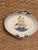 This is a Mot­tahedeh “Our Maritime Heritage” porcelain dish, featuring the U.S. Frigate Constitution—better known as “Old...