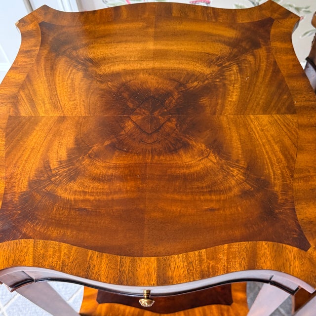 Pair of Maitland Smith Flame Mahogany Side Tables Serpentine square tops with brass ormolu and curved legs with brass...