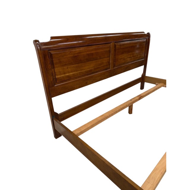 Beautiful vintage Stickley solid cherry king-size bed, dating to the 1990s. Expertly crafted from rich solid cherry, this...