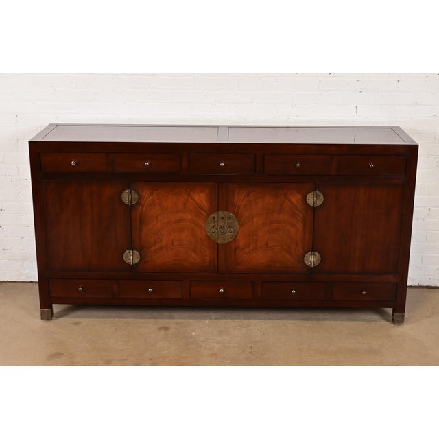 A gorgeous Hollywood Regency Chinoiserie mahogany sideboard, credenza, or bar cabinet By Michael Taylor for Baker...