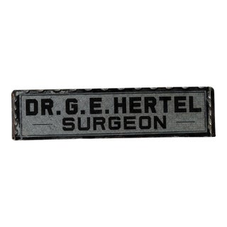 Antique "Dr. g.e. Hertel, Surgeon" Foil-Backed Scalloped-Edged Glass Sign For Sale