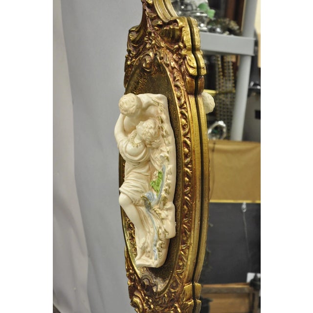 Wood Vintage French Rococo Large Gold Wall Mirror With Bisque Figural Lovers Plaques For Sale - Image 7 of 12